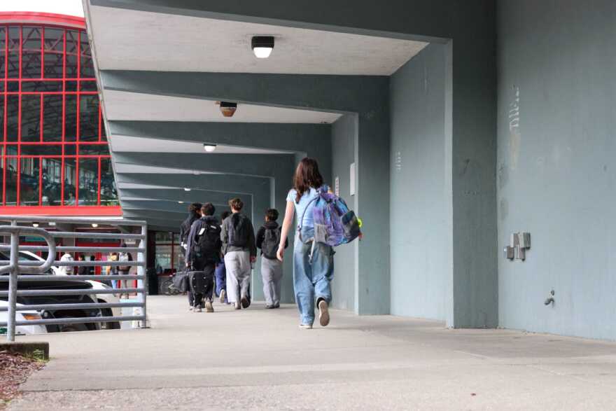 Students walk into Juneau-Douglas High School: Yadaa.at Kalé on Aug. 15, 2025.