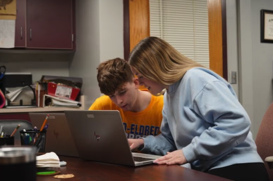 Otto-Eldred students Jack Sherry and Alexis Prince boot up their refurbished, school-issued laptops. 