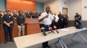 Ferguson Police Chief Troy Doyle speaks to media Saturday afternoon after one of the department’s officers, Travis Brown, suffered a severe brain injury Friday night while attempting to arrest a protester.