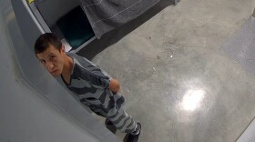 In this image from video provided by the Missouri State Highway Patrol, Immigration and Customs Enforcement detainee Brayan Rayo Garzon looks towards a surveillance camera in the Phelps County jail in Rolla, Mo., on April 7, 2025, shortly before he died by suicide.