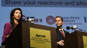 Betsy and Rodney at their podiums