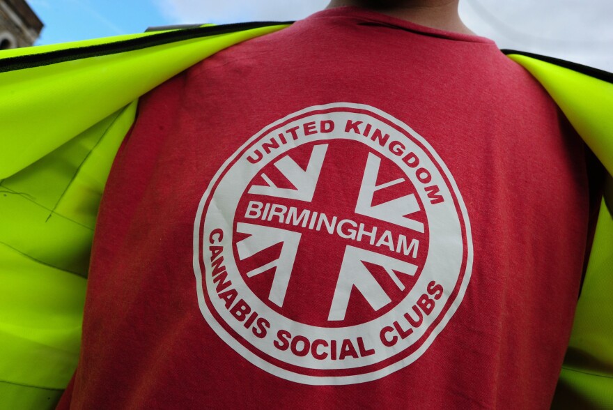 A man wears a U.K. cannabis social clubs T-shirt at an October 2013 rally in London supporting the legalization of marijuana.