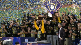Milwaukee Brewers catcher William Contreras holds the MVP trophy after they won baseball's World Series against the Tampa Bay Rays, Wednesday, Oct. 28, 2026, in St. Petersburg, Fla.