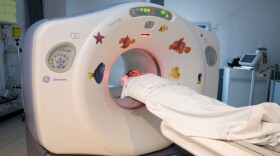 Complicated genetic engineering may be the answer to eliminating drug resistance in leukemia patients. This cancer patient is getting a CT scan.