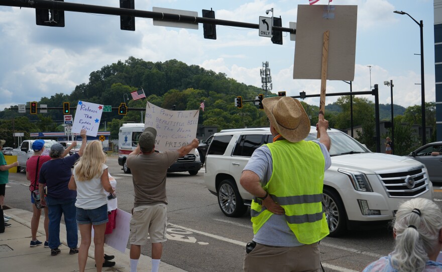 Demonstrators participate in Indivisible Knoxville’s Labor of Love protest on Henley Street Bridge in Knoxville on September 1, 2025.