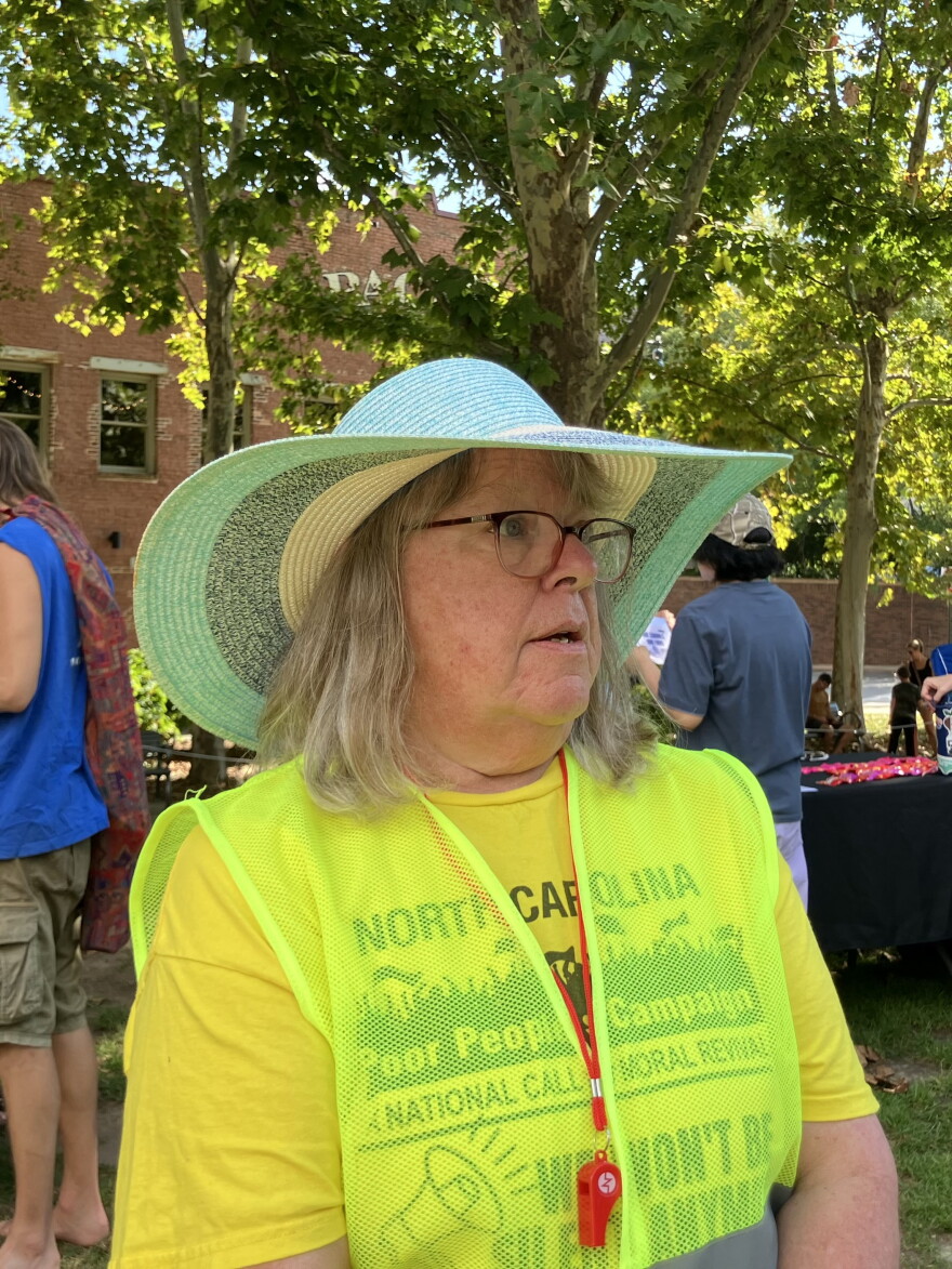Activist Leslie Boyd speaks to reporters at Pack Square Park in Asheville Sunday, August 30, 2026.