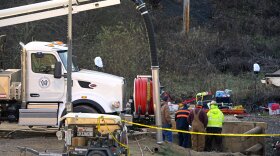 Rescue workers continue to search, Wednesday, Dec. 4, 2024, for Elizabeth Pollard, who is believed to have disappeared in a sinkhole while looking for her cat, in Marguerite, Pa.