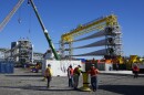 A generator and it's blades are prepared to head to the open ocean for the South Fork Wind farm from State Pier in New London, CT. 