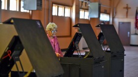 Judge of Elections Shirley Redick readies a polling machine for the 2024 Pennsylvania