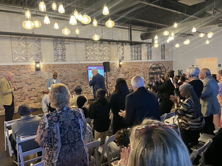 More than 100 people gathered in downtown Rock Hill to honor Wali Cathcart, 88, who stood at the podium. Cathcart and two other African Americans helped integrate baseball in the 1950s.