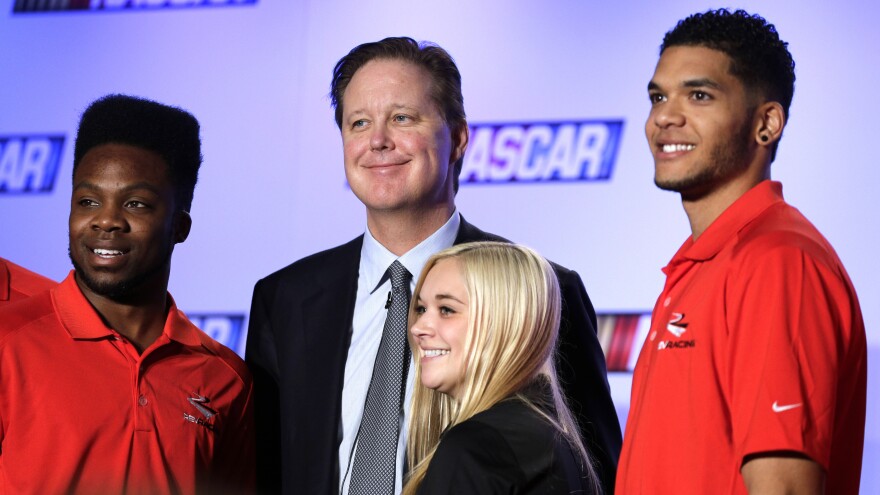 Driver Dylan Smith (right), appears with NASCAR CEO Brian France and fellow diversity drivers Devon Amos and Natalie Decker during a recent NASCAR media tour in Charlotte, N.C.