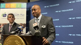 Roy Watson, Jr., a vice president at Blue Cross NC, speaks Friday afternoon after the N.C. State Health Plan Board of Trustees voted to re-install the insurer as the plan's third party administrator beginning in 2028. State Treasurer Brad Briner said Blue Cross was a clear standout in response to the state's RFP.