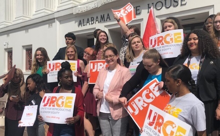 The Unite for Reproductive and Gender Equity coalition demonstrated outside the Alabama State House last month.