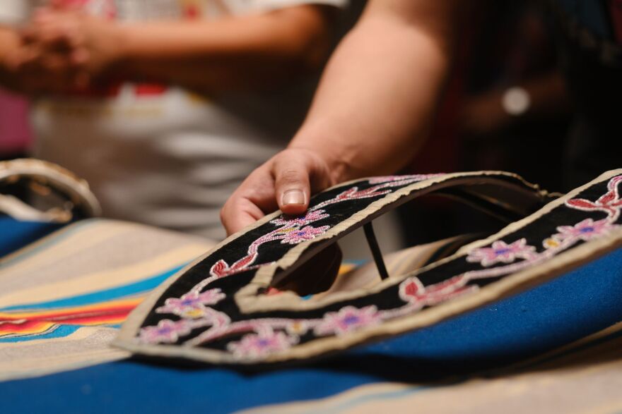 Through the reunification process, Indigenous relatives could pick up the cultural objects and feel the fabric and materials used in each item.