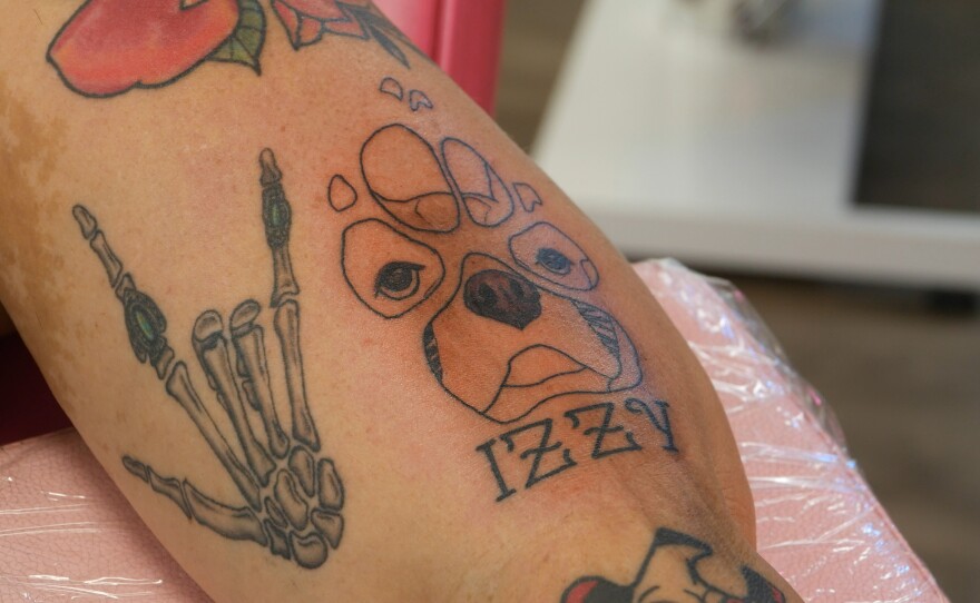 Cheyenne Rollerson had been carrying her dog’s ashes for 6 years. And for one young mother…the answer was a place where she'd never have to let go. Izzy was a Boston terrier who passed away after being bitten by a rattle snake while protecting the families two young siblings who were also playing outside at the time. Rollerson honored her beloved pet by mixing a small amount into tattoo in and then added into a tattoo at artistic soul tattoo in Chiefland. What people decide about their end of life arrangements can say *everything* about how they lived. We met with three families who chose a *different* kind of goodbye. One by land, one by water and another just under the skin.