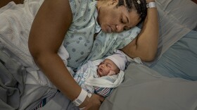 Erashea Bellany holds her daughter, Amenjah. Bellany, from Richmond, gave birth at her mother’s home in Hampton. After delivery, Erashea hemorrhaged and her midwife, Nicole Wardlaw, rushed her to the Sentara CarePlex hospital in Hampton. Both mother and daughter are doing fine.