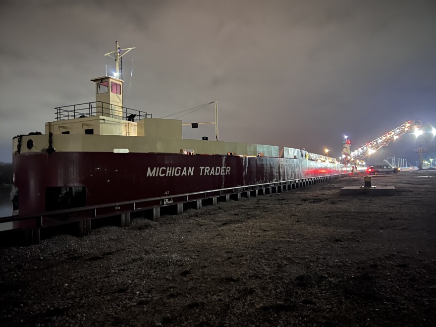 The bulk carrier Michigan Trader moored in a Great Lakes port.