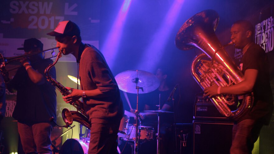 Nathaniel Cross on trombone, Binker Golding on tenor saxophone, Moses Boyd on drums  and Theon Cross on tuba perform at SXSW in March 2017.