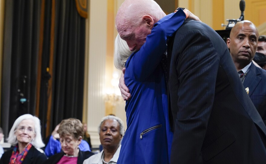 Vice chair Rep. Liz Cheney, R-Wyo., hugs Rusty Bowers, Arizona state House Speaker, during a break.