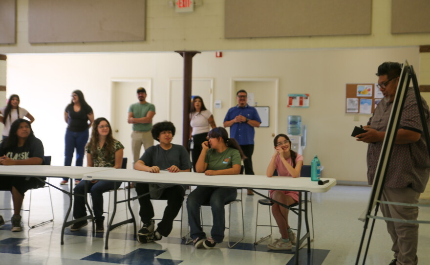 Youth at the Cocopah's Johnson O'Malley summer program listen on with interest as Joe Rodriguez speaks.