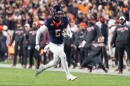 Virginia wide receiver Kameron Courtney (5) runs the ball downfield against Virginia Tech during the first half of an NCAA college football game, Saturday, Nov. 29, 2025, in Charlottesville, VA.