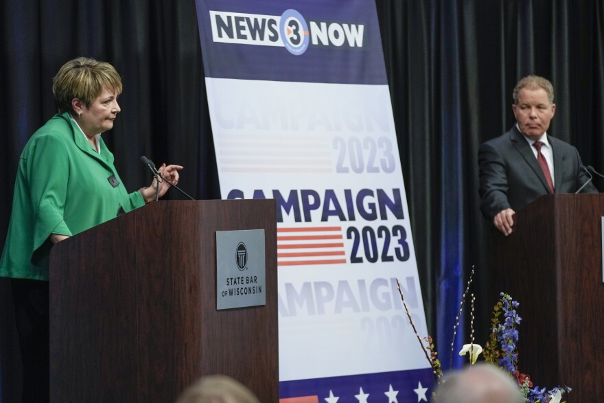 Wisconsin Supreme Court candidates Republican-backed Dan Kelly and Democratic-supported Janet Protasiewicz participate in a debate Tuesday, March 21, 2023, in Madison, Wis.