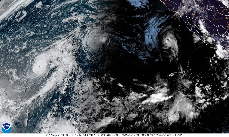 A satellite image shows from left to right, Hurricane Lowell, Post-Tropical Cyclone Karina and Tropical Storm Marie in the Pacific on Sunday evening, Sept. 6, 2026.