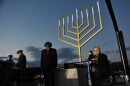 Violinist Itzhak Perlman is seen onstage before his performance at the annual national Hanukkah menorah lighting ceremony on the White House Ellipse on Dec. 1, 2010.