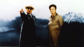 Kim Jong Il (right) and his father, Kim Il Sung, are pictured on what is believed to be Paekdoo San, a mountain located along the Sino-North Korean border in this image released by the North Korean news agency in 1994.
