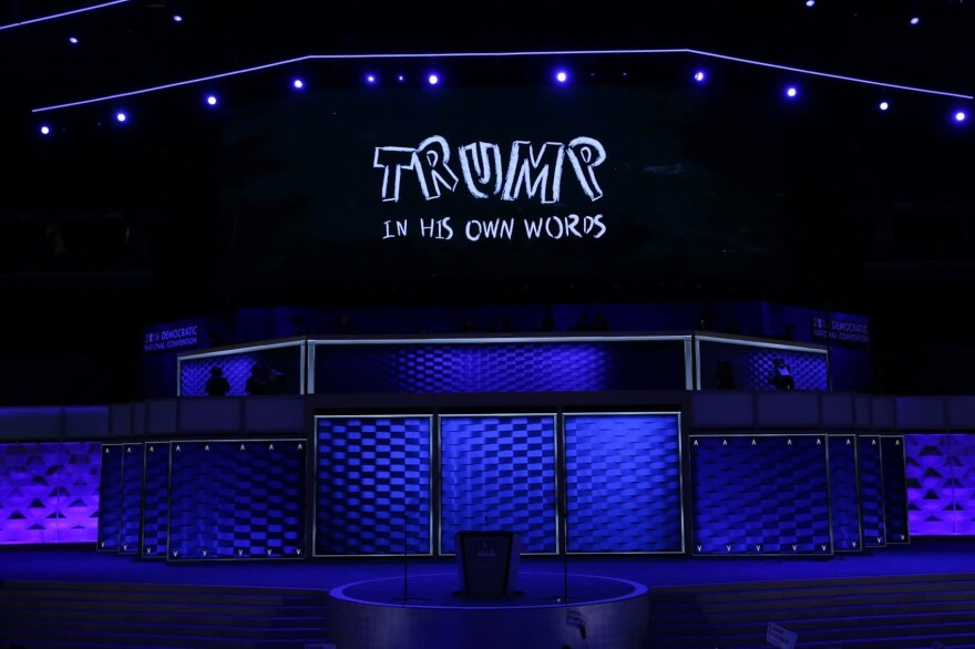 A screen displays a video clip about Republican presidential candidate Donald Trump on the first day of the Democratic National Convention at the Wells Fargo Center, July 25, 2016 in Philadelphia, Pennsylvania. (Alex Wong/Getty Images)