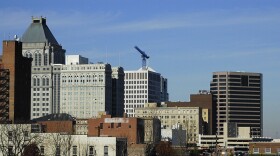 High levels of the likely human carcinogen 1,4 Dioxane have been identified at Greensboro's wastewater treatment plant. Photo of Greensboro downtown skyline.