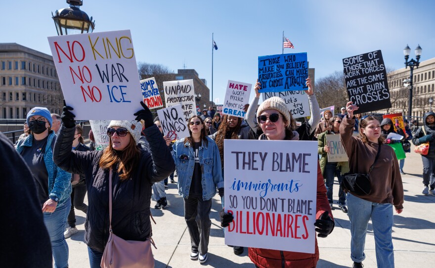 Thousands gathered at the Michigan Capitol in Lansing, Mich., on March 28, 2026, for a No Kings rally.