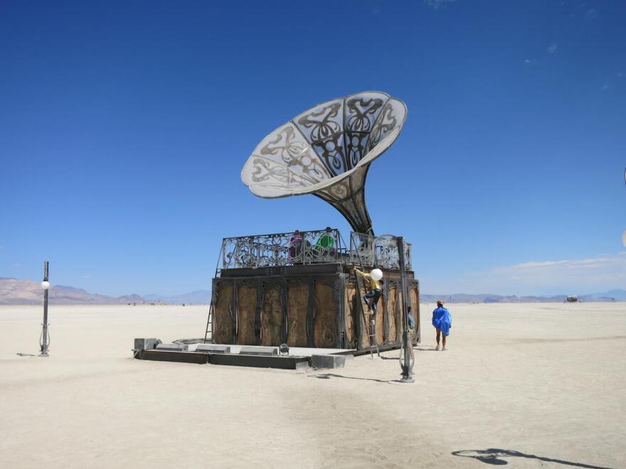 A sculpture made to look like a gramophone sits among other art installations built for Burning Man during the 2017 festival in the Black Rock Desert, Nev.