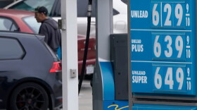 A gasoline price board is displayed at a gas station in San Francisco, Tuesday, July 19, 2022.