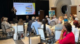 Tourism Commissioner Joseph Boschulte gives presentation to members of the USVI Hotel & Tourism Association at their annual meeting on Thursday.