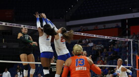 Florida outside hitter Kamryn Chaney (7) and middle blocker Alec Rothe (25) block the ball during an NCAA volleyball match against Jacksonville Sept. 23, 2026, in Gainesville, Fla. (Reagan Bresnahan/WRUF).