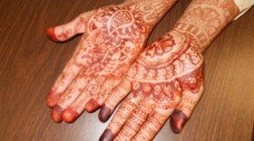 Jaya's henna-painted hands.