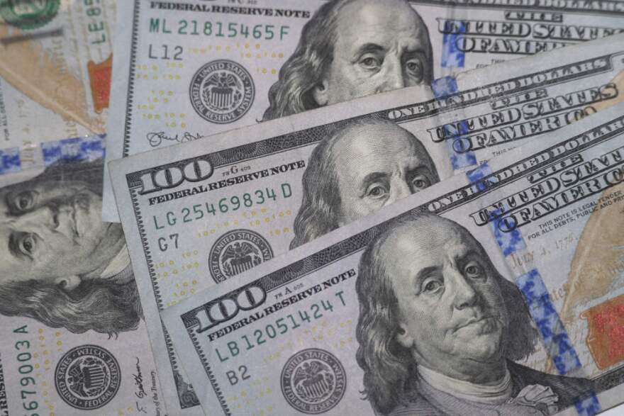 The likeness of Benjamin Franklin on $100 bills in Dallas. (LM Otero/AP)