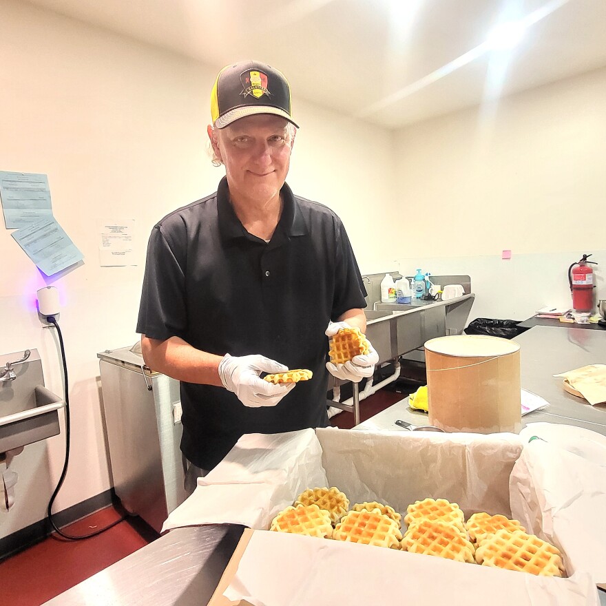 Marc Leberger, owner of Georgette’s Galettes grabs frozen waffles to make vanilla ice cream sandwiches.