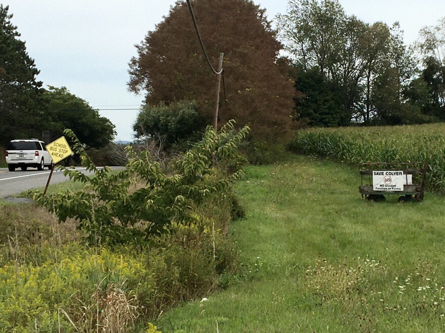 A sign along U.S. Route 322 in Potter Township, Centre County, urges the state to "Save Colyer … No Divided Families or Farms."