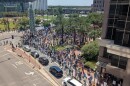 More than a thousand No Kings protesters gathered at City Hall in Orlando on Saturday.