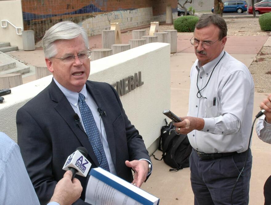 Man talks to reporters