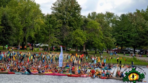 Boaters in the 2024 group photo for Floatzilla at Lake Potter in Rock Island.