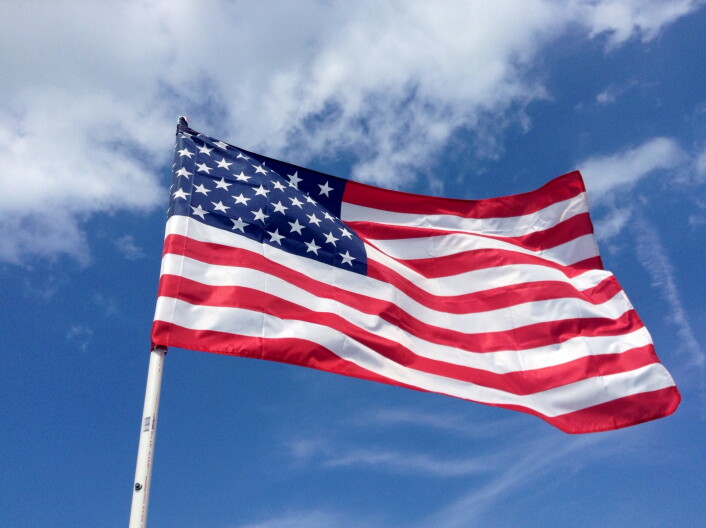 An American Flag waves in the wind.