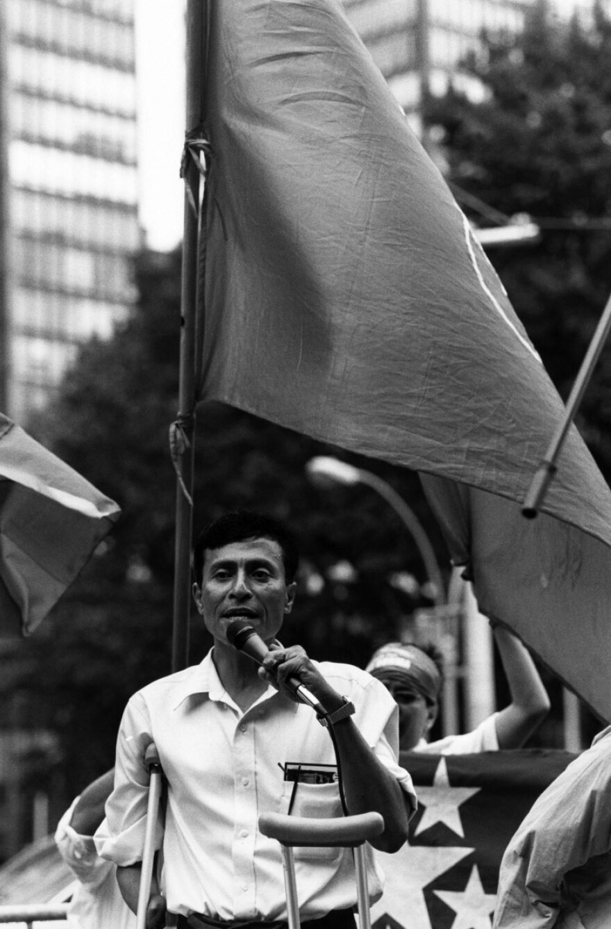 Myo Myint gives a speech outside the UN HQ in New York on the 08/08/08, the 20th anniversary of the 1988 uprising.
