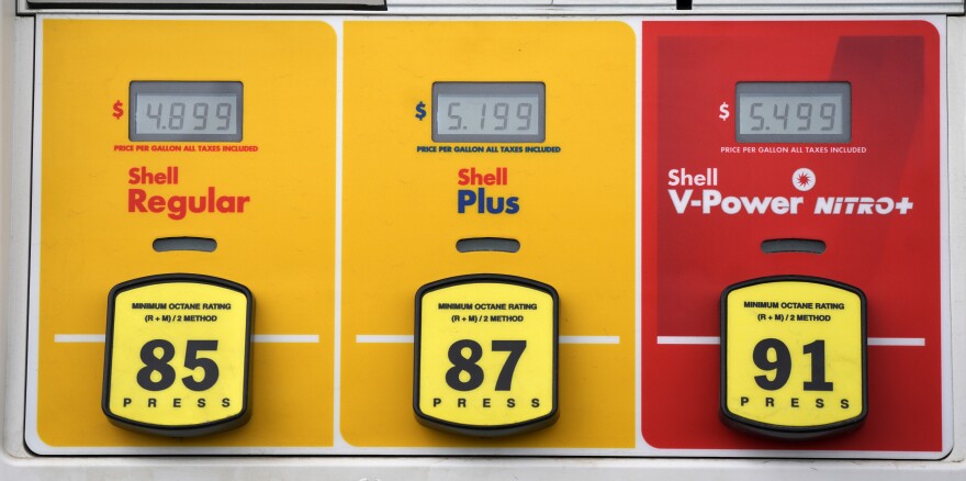 The prices of the various grades of gasoline are displayed on the pump at a Shell station Wednesday, June 22, 2022, in the south Denver suburb of Englewood, Colo.