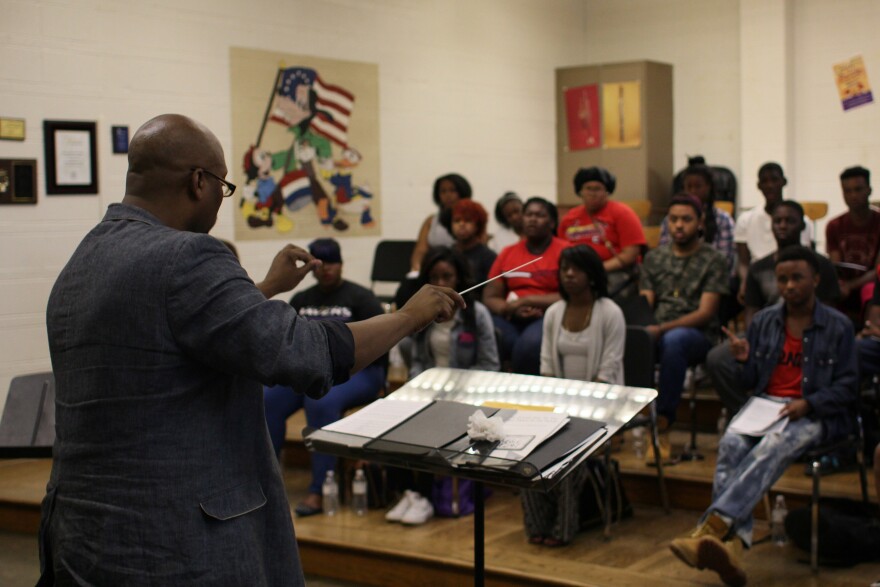 Duane Foster conducts the Normandy High School Choir