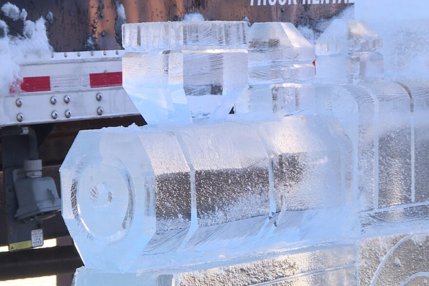 An ice sculpture being prepared for Bloomington's first Freezefest.