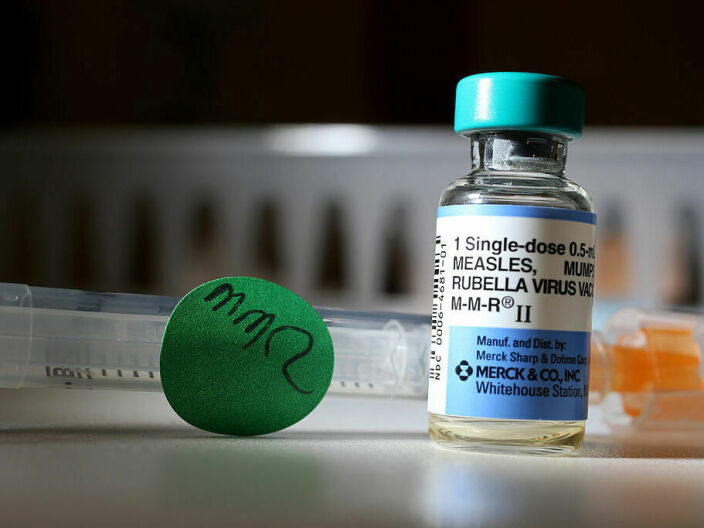 A dose of the measles, mumps and rubella vaccine.