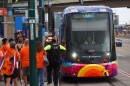Netherlands fans crowd onto the Kansas City Streetcar after the Oranje Fanwalk on June 25,2026.
